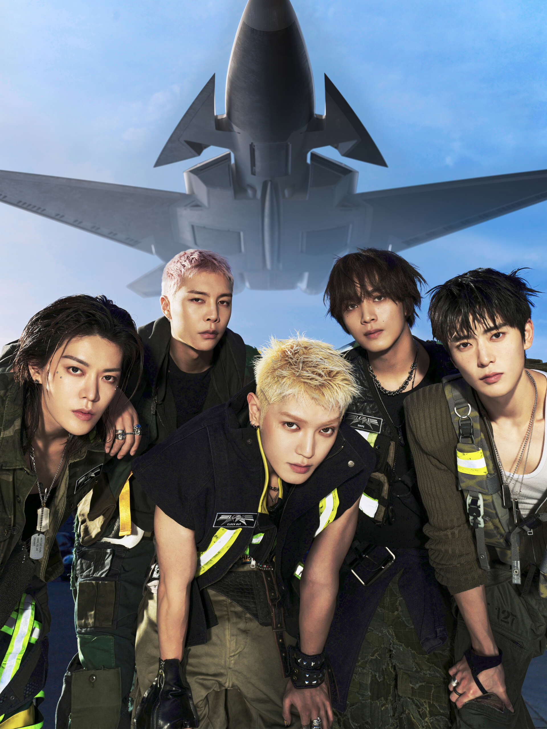 Five NCT 127 members in the official BLINGY JETS press image