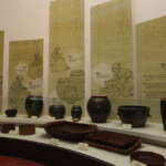 Illustrated fermentation-history panels and earthenware jars inside Sunchang Jangryu Museum